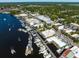 Panoramic aerial view of the waterfront area filled with boats, buildings, and lush greenery at 224 Oak Bay Dr., Georgetown, SC 29440