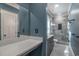 Stylish bathroom features a modern vanity, large mirror, and glass enclosed shower at 224 Oak Bay Dr., Georgetown, SC 29440