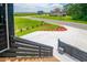 Scenic view from the porch, highlighting the manicured lawn and access to outdoor splendor and relaxation at 224 Oak Bay Dr., Georgetown, SC 29440
