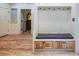 Mudroom features built-in bench with storage and hooks for coats and bags at 224 Oak Bay Dr., Georgetown, SC 29440