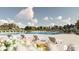 Resort-style pool with lounge chairs and umbrellas surrounded by a serene landscape at 246 River Edge Dr., Myrtle Beach, SC 29588