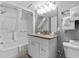 Bathroom with a shower-tub combo, white vanity, and granite countertop at 2801 S Ocean Blvd. # 231, North Myrtle Beach, SC 29582
