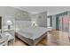 Bright, airy bedroom with stylish decor, opening to a balcony and featuring a desk space at 2801 S Ocean Blvd. # 231, North Myrtle Beach, SC 29582