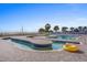 This is a pool with a lazy river section and lounge chairs at 2801 S Ocean Blvd. # 231, North Myrtle Beach, SC 29582