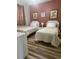 Bedroom with two beds, side table, and decor at 4639 Wild Iris Dr. # 43-204, Myrtle Beach, SC 29577