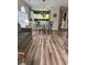 Living and dining area displaying laminate floors and an open-concept design at 4639 Wild Iris Dr. # 43-204, Myrtle Beach, SC 29577