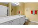 Well-lit bathroom with a spacious vanity, sink, and ample counter space next to a separate room that holds the shower at 471 Deerfield Links Dr., Surfside Beach, SC 29575