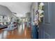 Open entryway showcasing hardwood floors, high ceilings, and a glimpse into the spacious living areas at 471 Deerfield Links Dr., Surfside Beach, SC 29575