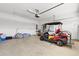 Spacious garage with a golf cart and lots of room for tools, storage and parking at 471 Deerfield Links Dr., Surfside Beach, SC 29575