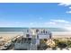 Daytime view of the newly rebuilt Surfside Beach Pier, a local coastal attraction at 471 Deerfield Links Dr., Surfside Beach, SC 29575