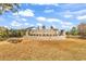The Reserve at Pine Lakes community sign with mature landscaping on a sunny day at 5606 Whitebark Dr., Myrtle Beach, SC 29577
