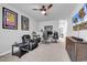A versatile space with a ceiling fan, offering both relaxation and productivity areas in a relaxing setting at 5606 Whitebark Dr., Myrtle Beach, SC 29577