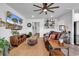 Bright living room with a ceiling fan, comfortable seating, and stylish decor for relaxation and entertainment at 5606 Whitebark Dr., Myrtle Beach, SC 29577