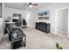 A versatile space with a ceiling fan, offering both relaxation and productivity areas in a relaxing setting at 5606 Whitebark Dr., Myrtle Beach, SC 29577