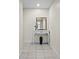 Bright entryway featuring a decorative table, mirror and vase creating a welcoming ambiance at 601 Mitchell Dr. # 801, Myrtle Beach, SC 29577