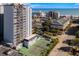 An aerial view shows a community pool and tennis court for residents enjoyment at 601 Mitchell Dr. # 801, Myrtle Beach, SC 29577