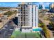 This aerial view showcases the proximity to the beach, ample parking, tennis courts, and pool at 601 Mitchell Dr. # 801, Myrtle Beach, SC 29577