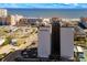 Coastal condominium building with ocean view, nearby restaurants, shopping, and amenities at 601 Mitchell Dr. # 801, Myrtle Beach, SC 29577