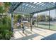 Built-in grills and seating are provided in the pergola-covered grilling area for easy outdoor cooking and entertaining at 601 Mitchell Dr. # 801, Myrtle Beach, SC 29577