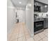 Hallway view of kitchen and tile floor at 601 Mitchell Dr. # 801, Myrtle Beach, SC 29577