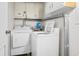 Laundry room with washer and dryer and exposed pipes at 601 Mitchell Dr. # 801, Myrtle Beach, SC 29577