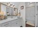 Bathroom featuring a vanity with a sink, a large mirror, and a shower/tub combo at 100 Marblehead Dr., Little River, SC 29566