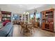 Formal dining room with chandelier, hardwood floors, and elegant furnishings at 100 Marblehead Dr., Little River, SC 29566