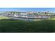 Picturesque waterfront view featuring a private dock for boating and enjoying the scenic surroundings at 100 Marblehead Dr., Little River, SC 29566