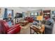 Cozy living room with hardwood floors, plush furnishings, and natural light at 100 Marblehead Dr., Little River, SC 29566