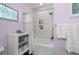 Main bathroom featuring a soaking tub, tiled shower, shelving for storage and decorative lighting at 100 Marblehead Dr., Little River, SC 29566