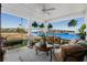 Inviting outdoor patio with comfortable seating and scenic waterfront views at 100 Marblehead Dr., Little River, SC 29566
