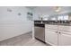 Galley kitchen featuring stainless steel appliances and beautiful granite countertops at 108 Ocean Blvd. N # 101, North Myrtle Beach, SC 29582