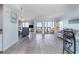 Spacious living room with sliding doors to a screened-in patio and ocean views at 108 Ocean Blvd. N # 101, North Myrtle Beach, SC 29582