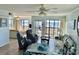 Inviting living room with cozy seating and sliding glass doors to the balcony at 108 Ocean Blvd. N # 101, North Myrtle Beach, SC 29582