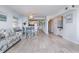 Inviting living space with tile floors and seamless flow between living areas at 108 Ocean Blvd. N # 101, North Myrtle Beach, SC 29582