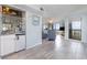 Comfortable living space that includes a wet bar and balcony access at 108 Ocean Blvd. N # 101, North Myrtle Beach, SC 29582