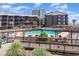 Community pool with beautiful pergola and ocean view at 108 Ocean Blvd. N # 101, North Myrtle Beach, SC 29582