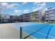 A well-maintained blue and green tennis court sits adjacent to the condo complex at 108 Ocean Blvd. N # 101, North Myrtle Beach, SC 29582