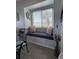 Inviting window seat offers a cozy reading nook with ocean views, adding charm and relaxation at 108 Ocean Blvd. N # 101, North Myrtle Beach, SC 29582