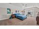 Spacious bedroom with a vaulted ceiling, neutral walls, carpet flooring, and a ceiling fan at 1127 East Isle Of Palms Ave., Myrtle Beach, SC 29579