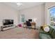 Bright bedroom space with a ceiling fan, desk, and media center at 1127 East Isle Of Palms Ave., Myrtle Beach, SC 29579
