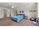 Large bedroom features a ceiling fan, neutral colored walls, and carpet flooring at 1127 East Isle Of Palms Ave., Myrtle Beach, SC 29579