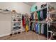 Organized walk-in closet features ample shelving and hanging space for clothes and accessories at 1127 East Isle Of Palms Ave., Myrtle Beach, SC 29579