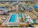 Aerial view of community center featuring pools, spas, a playground, and lounge seating at 1127 East Isle Of Palms Ave., Myrtle Beach, SC 29579