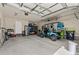 Spacious garage featuring a golf cart and plenty of storage space at 1127 East Isle Of Palms Ave., Myrtle Beach, SC 29579