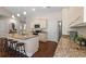 Well-lit kitchen features granite countertops, wood flooring, and modern stainless steel appliances at 1127 East Isle Of Palms Ave., Myrtle Beach, SC 29579