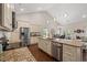Gourmet kitchen with granite countertops, stainless steel appliances, and an island with bar seating at 1127 East Isle Of Palms Ave., Myrtle Beach, SC 29579