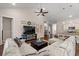 Spacious living room with high ceilings, comfortable seating, and an open floor plan at 1127 East Isle Of Palms Ave., Myrtle Beach, SC 29579