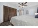 Serene bedroom with ample closet space, ceiling fan and soft, inviting textures at 1210 N Ocean Blvd. # 105, Surfside Beach, SC 29575