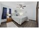 Comfortable bedroom featuring a ceiling fan, soft lighting, and a restful ambiance at 1210 N Ocean Blvd. # 105, Surfside Beach, SC 29575